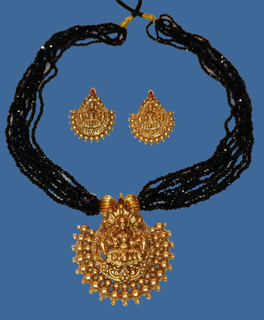CRYSTAL NECKLACE WITH LAKSHMI PENDANT